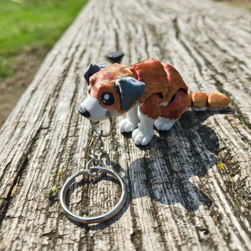 Pies Przewodnik – brelok 3D, ruchome łapki i ogon (S, ok. 6 cm)