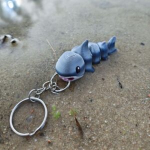 Ruchomy Brelok Uroczy Rekinek 3D – Twój Gibki Przyjaciel z Głębin